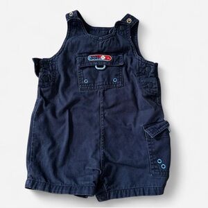 Navy blue baby sport vintage overalls with embroidered logo and snap buttons